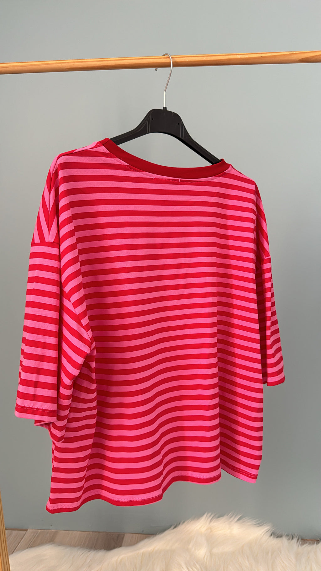 Top Olivia rose et rouge sur cintre